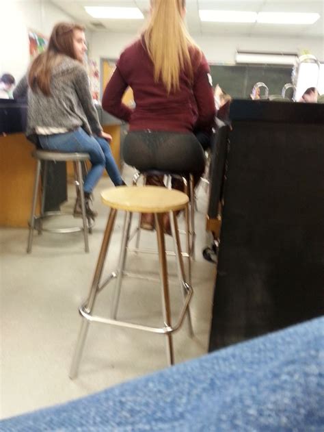 OH WOW! A student in chemistry class sits on a stool ...